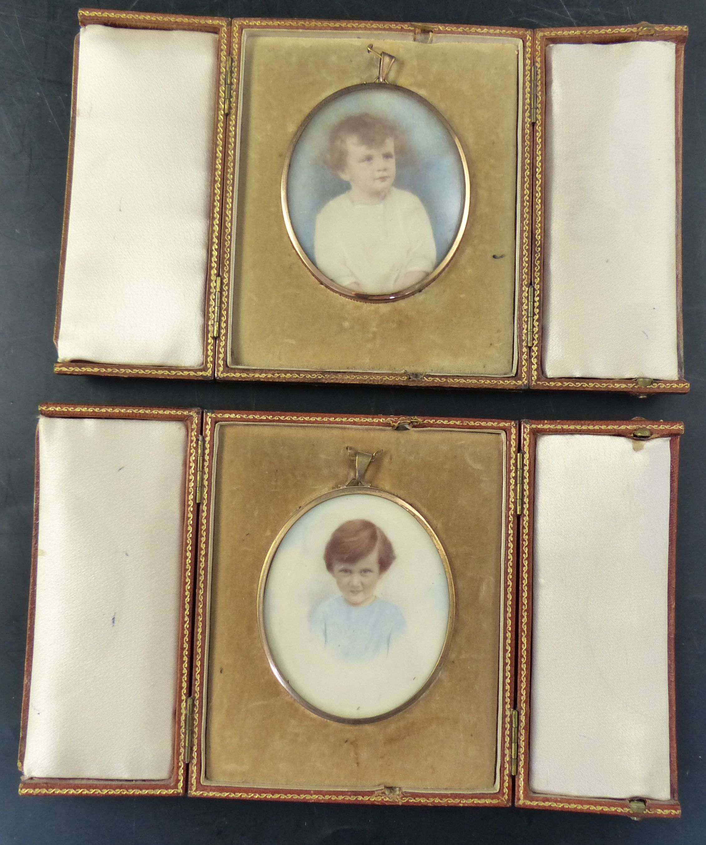 Two colour tinted miniature photographs of an infant boy and girl, cased and a collection of Asian gilt lacquer boxes and animal figure
